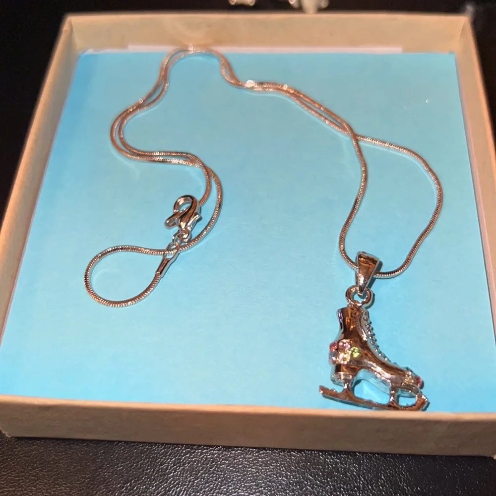 Silver skating necklace, penguin earrings and barrette